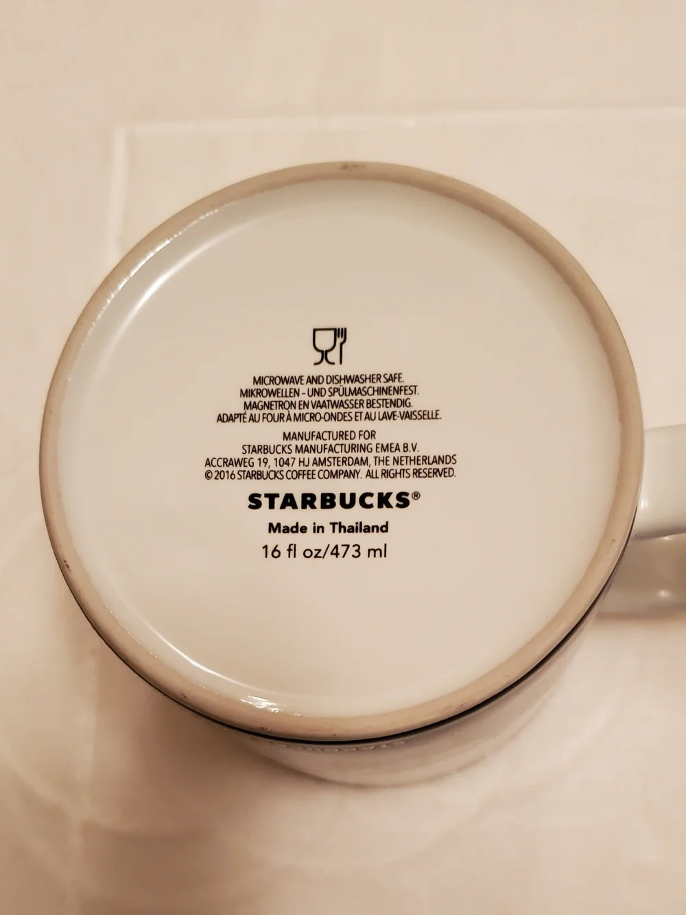 Starbucks Austria Souvenir Mug in Cream & Brown with Tan Hat Artwork